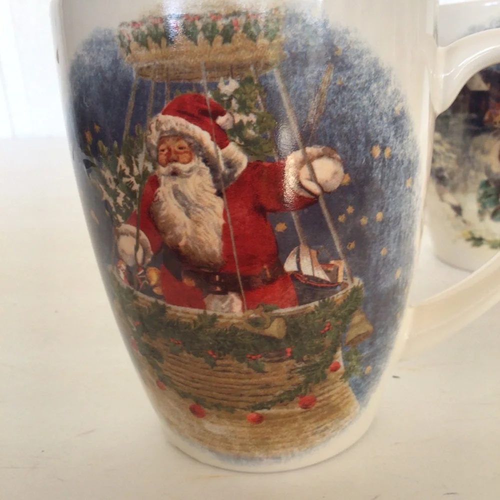 POTTERY BARN SET OF TWO NOSTALGIC SANTA MUGS